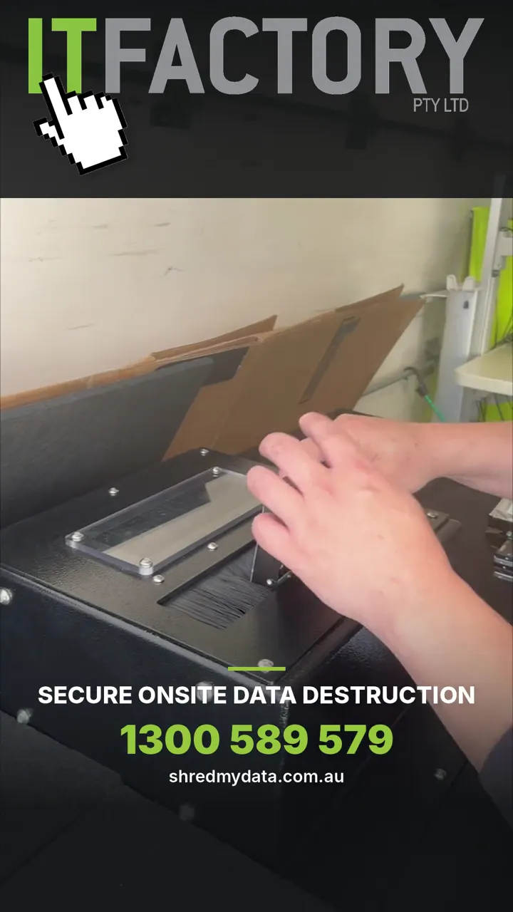 IT Factory worker operating the mobile data destruction equipment